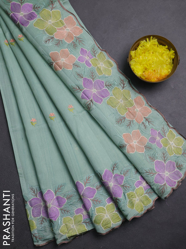 Semi raw silk saree pastel green with embroidery buttas and embriodery border