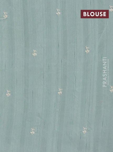 Semi raw silk saree pastel green with embroidery buttas and embriodery border