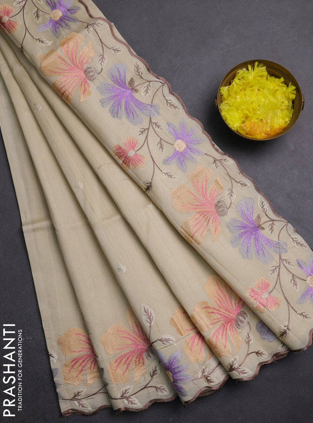 Semi raw silk saree beige with embroidery buttas and embriodery border