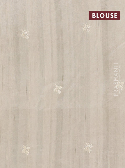 Semi raw silk saree beige with embroidery buttas and embriodery border