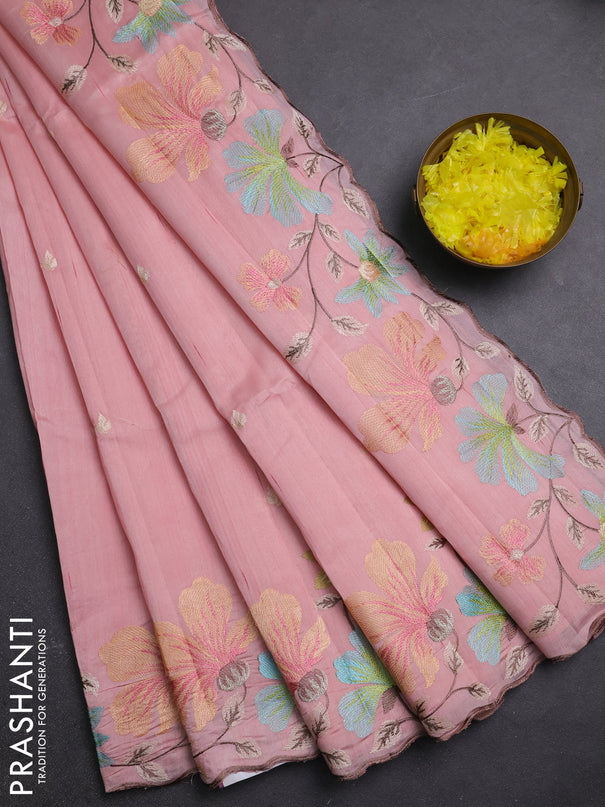 Semi raw silk saree peach shade with embroidery buttas and embriodery border