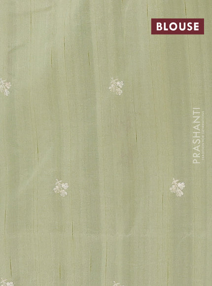 Semi raw silk saree pista green with embroidery buttas and embriodery border