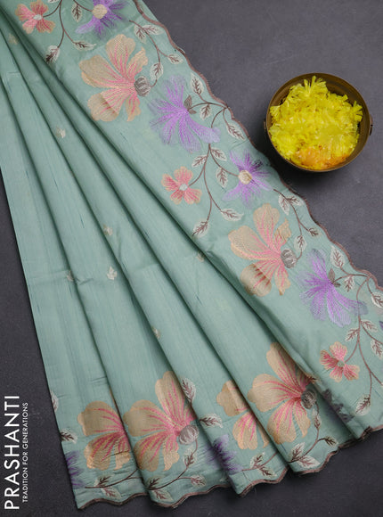 Semi raw silk saree pastel green with embroidery buttas and embriodery border