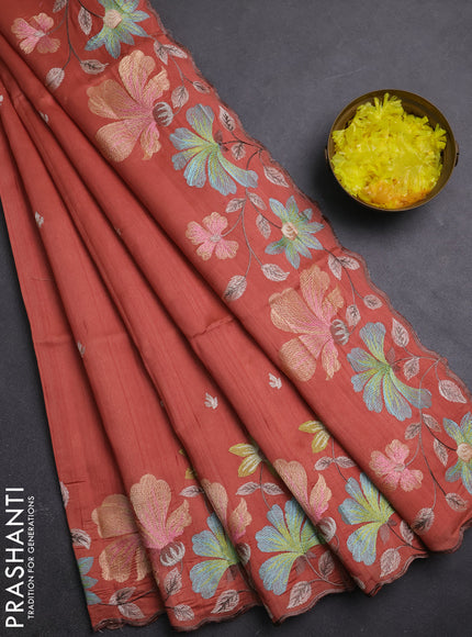Semi raw silk saree rust shade with embroidery buttas and embriodery border