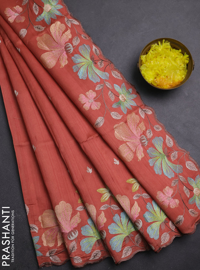 Semi raw silk saree rust shade with embroidery buttas and embriodery border