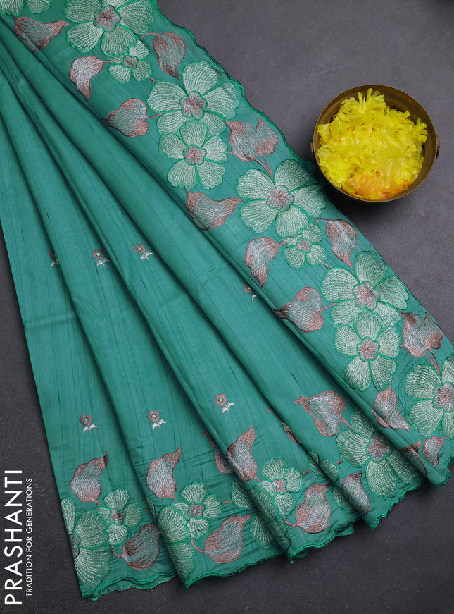 Semi raw silk saree teal blue shade with embroidery buttas and embriodery border
