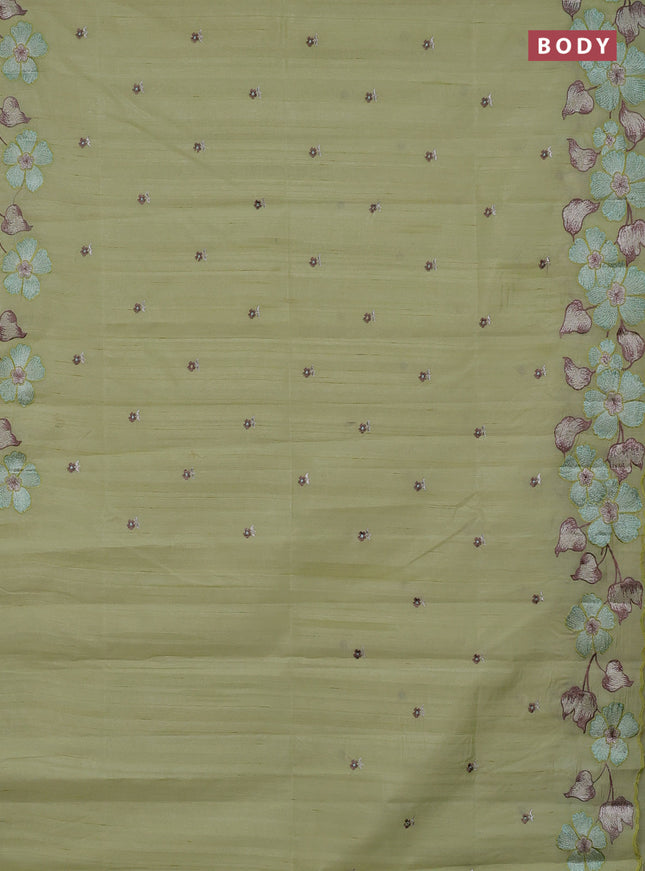 Semi raw silk saree pista green with embroidery buttas and embriodery border