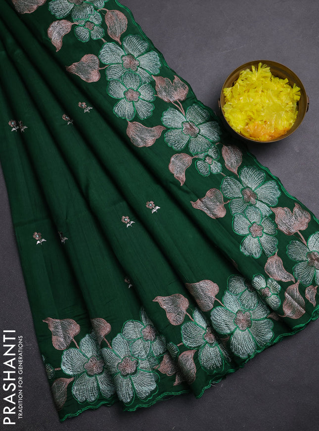 Semi raw silk saree green with embroidery buttas and embriodery border