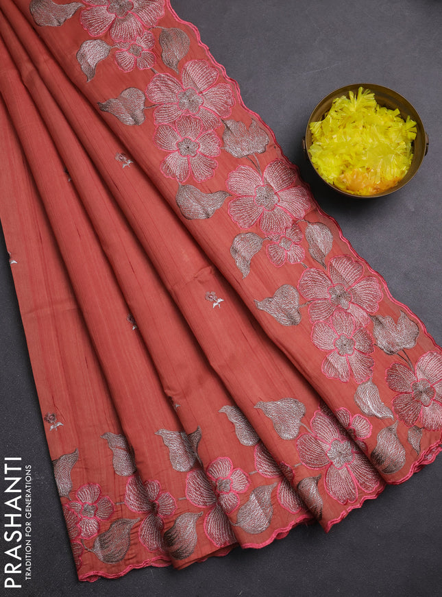 Semi raw silk saree rust shade with embroidery buttas and embriodery border