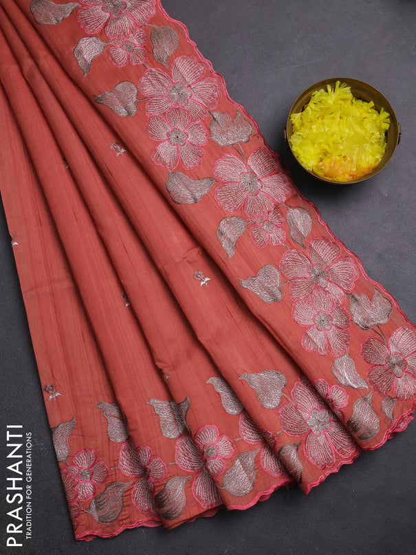 Semi raw silk saree rust shade with embroidery buttas and embriodery border