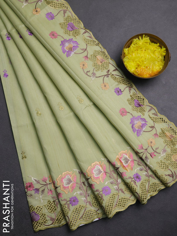 Semi raw silk saree pista green with embroidery buttas and embriodery border