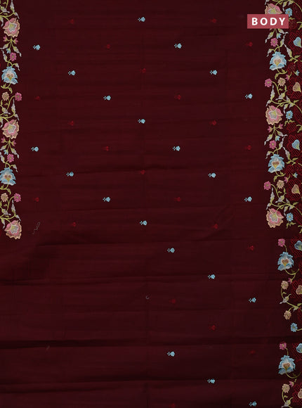 Semi raw silk saree deep maroon with embroidery buttas and embriodery border