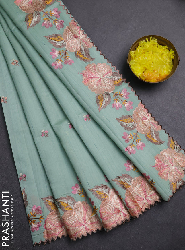 Semi raw silk saree pastel green with embroidery buttas and embriodery border