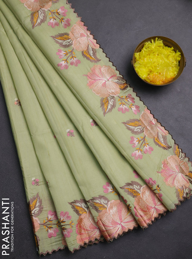 Semi raw silk saree pista green with embroidery buttas and embriodery border