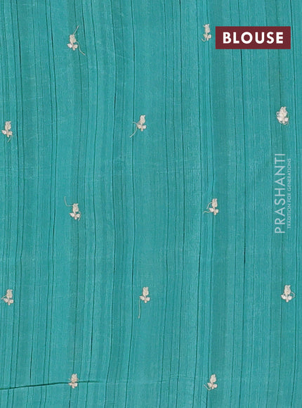Semi raw silk saree teal green with embroidery buttas and embriodery border