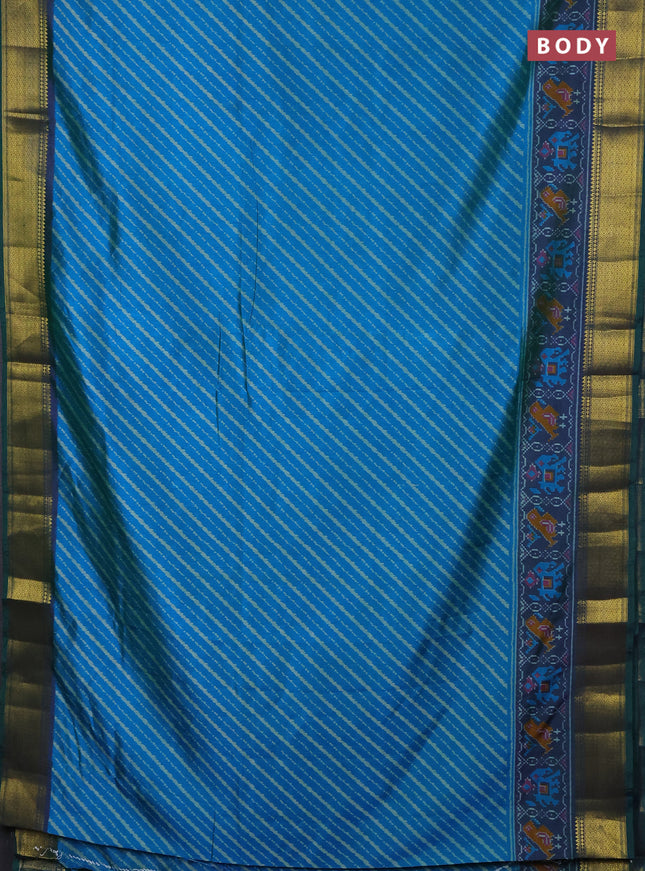 Semi tussar saree cs blue and bottle green with allover leheriya weaves and zari woven border