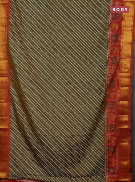 Semi tussar saree mehendi green and rustic shade with allover leheriya weaves and zari woven border