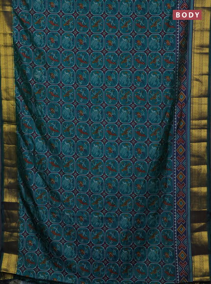 Semi tussar saree peacock green and peacock blue with allover patola prints and zari woven border
