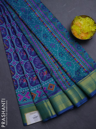 Semi tussar saree navy blue and teal green with allover patola prints and zari woven border