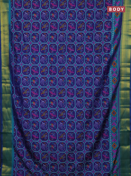 Semi tussar saree navy blue and teal green with allover patola prints and zari woven border