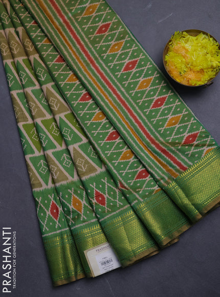 Semi tussar saree peach shade and light green with allover ikat prints and zari woven border