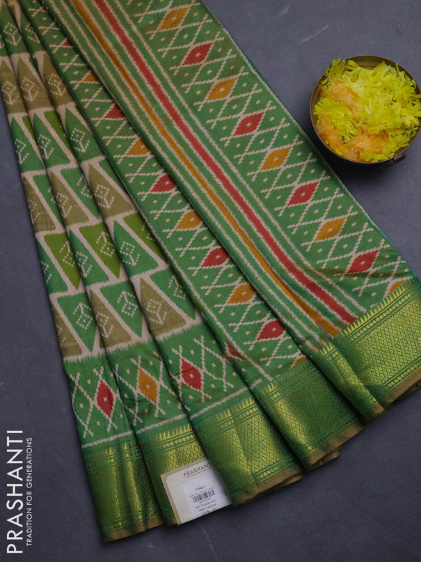 Semi tussar saree peach shade and light green with allover ikat prints and zari woven border
