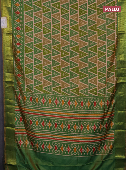 Semi tussar saree peach shade and light green with allover ikat prints and zari woven border