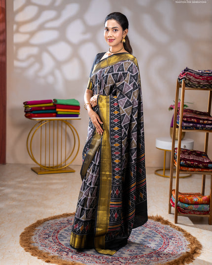 Semi tussar saree grey and black with allover ikat prints and zari woven border