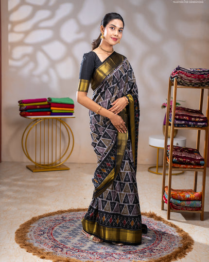 Semi tussar saree grey and black with allover ikat prints and zari woven border