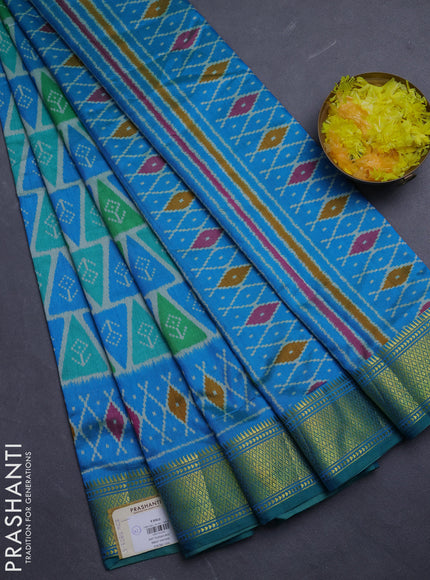 Semi tussar saree teal green and cs blue with allover ikat prints and zari woven border