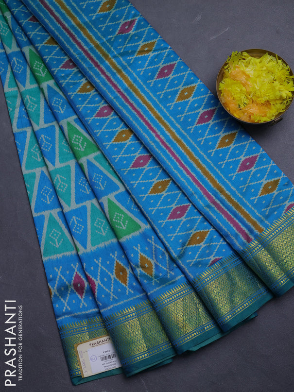 Semi tussar saree teal green and cs blue with allover ikat prints and zari woven border