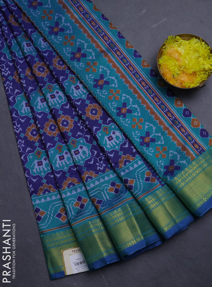 Semi tussar saree navy blue and teal green with allover patola prints and zari woven border
