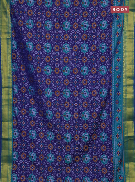 Semi tussar saree navy blue and teal green with allover patola prints and zari woven border
