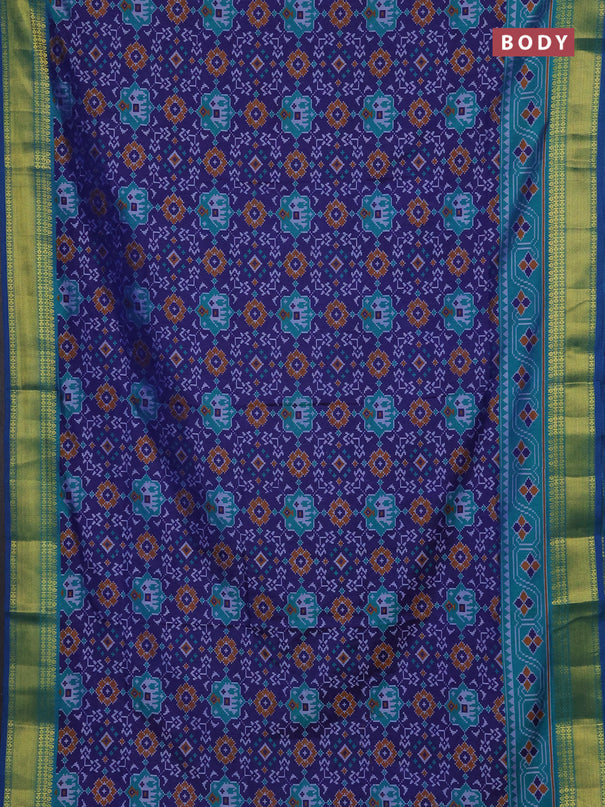 Semi tussar saree navy blue and teal green with allover patola prints and zari woven border