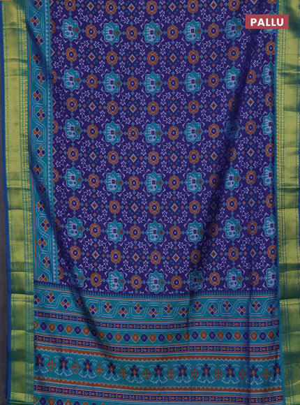 Semi tussar saree navy blue and teal green with allover patola prints and zari woven border