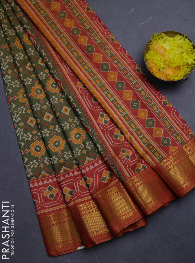 Semi tussar saree mehendi green and dark mustard with allover patola prints and zari woven border