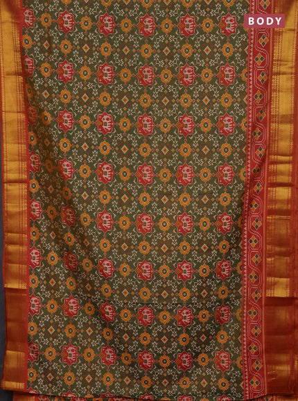 Semi tussar saree mehendi green and dark mustard with allover patola prints and zari woven border