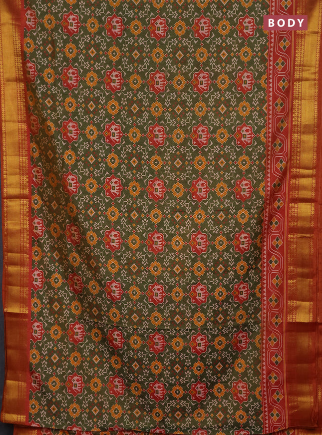 Semi tussar saree mehendi green and dark mustard with allover patola prints and zari woven border