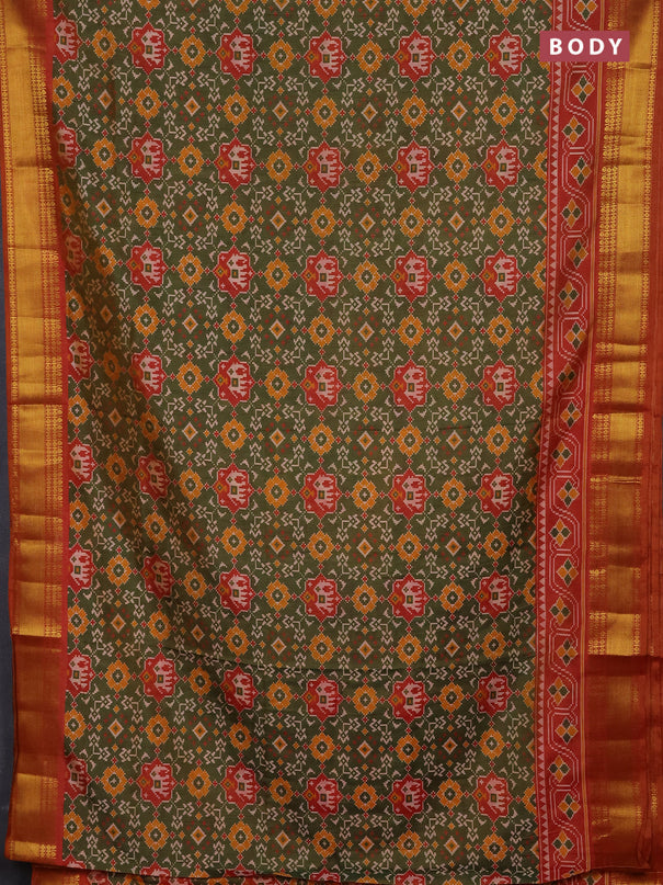 Semi tussar saree mehendi green and dark mustard with allover patola prints and zari woven border