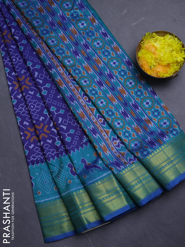Semi tussar saree navy blue and teal green with allover ikat prints and temple design zari woven border