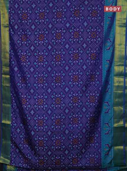 Semi tussar saree navy blue and teal green with allover ikat prints and temple design zari woven border