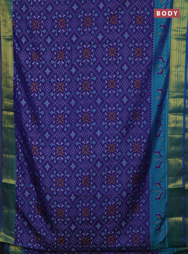 Semi tussar saree navy blue and teal green with allover ikat prints and temple design zari woven border