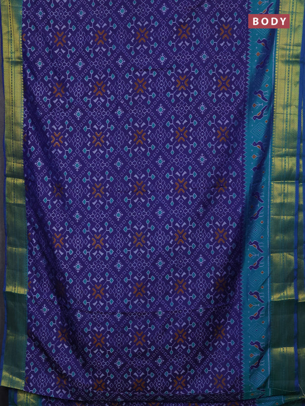 Semi tussar saree navy blue and teal green with allover ikat prints and temple design zari woven border
