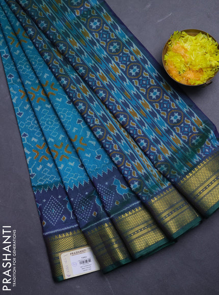 Semi tussar saree dual shade of greenish blue and dual shade of bluish green with allover ikat prints and temple design zari woven border