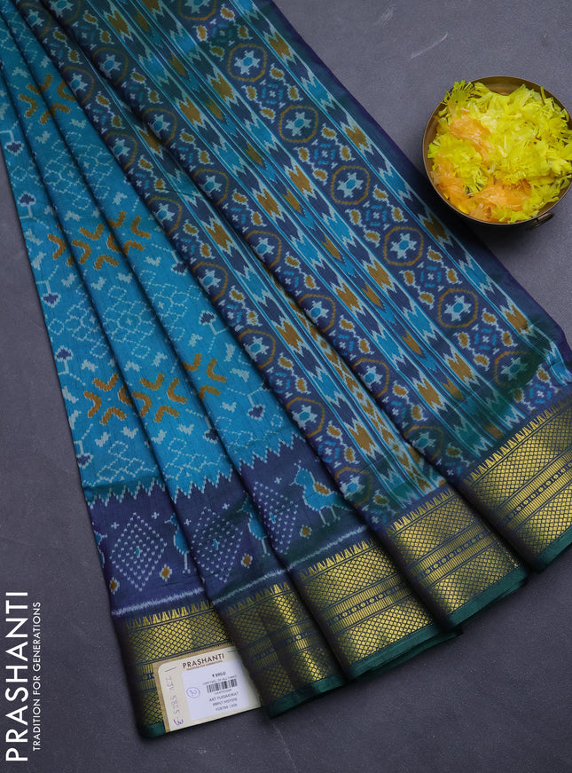 Semi tussar saree dual shade of greenish blue and dual shade of bluish green with allover ikat prints and temple design zari woven border