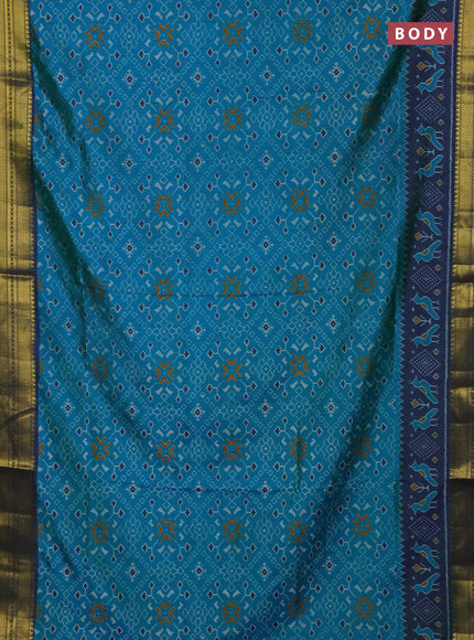 Semi tussar saree dual shade of greenish blue and dual shade of bluish green with allover ikat prints and temple design zari woven border