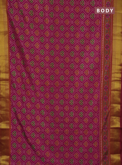 Semi tussar saree dark pink and orange with allover ikat butta prints and zari woven border