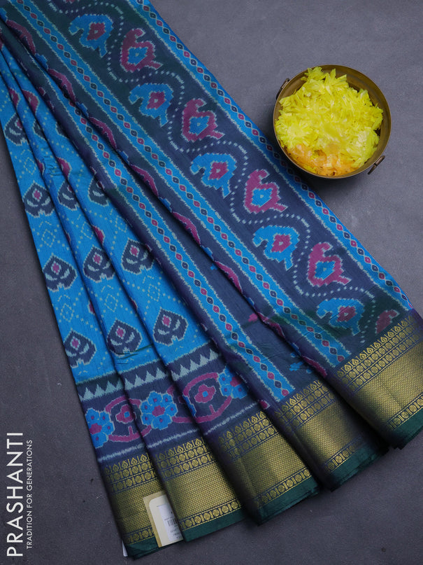Semi tussar saree cs blue and bottle green with allover ikat butta prints and zari woven border