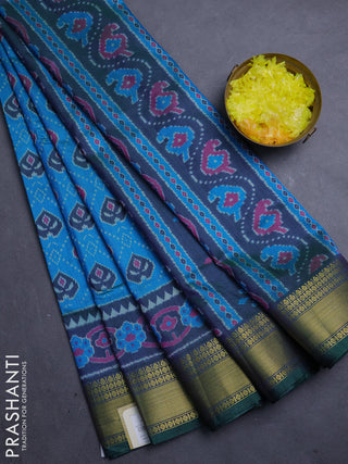 Semi tussar saree cs blue and bottle green with allover ikat butta prints and zari woven border