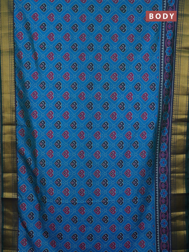 Semi tussar saree cs blue and bottle green with allover ikat butta prints and zari woven border